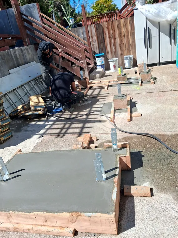 New concrete footing being formed for exterior stair work