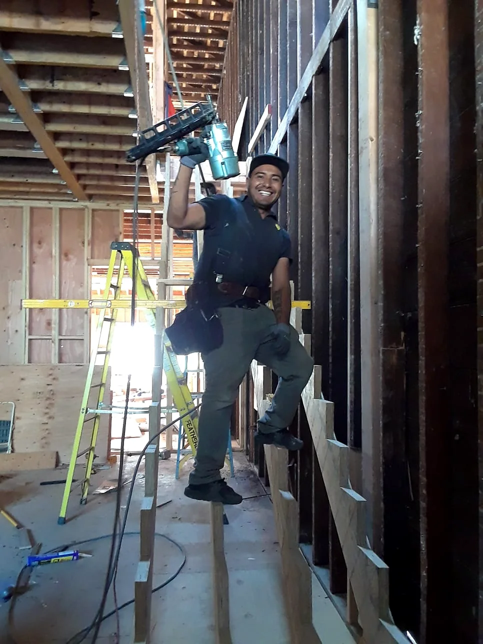 Carpenter working within residential framing