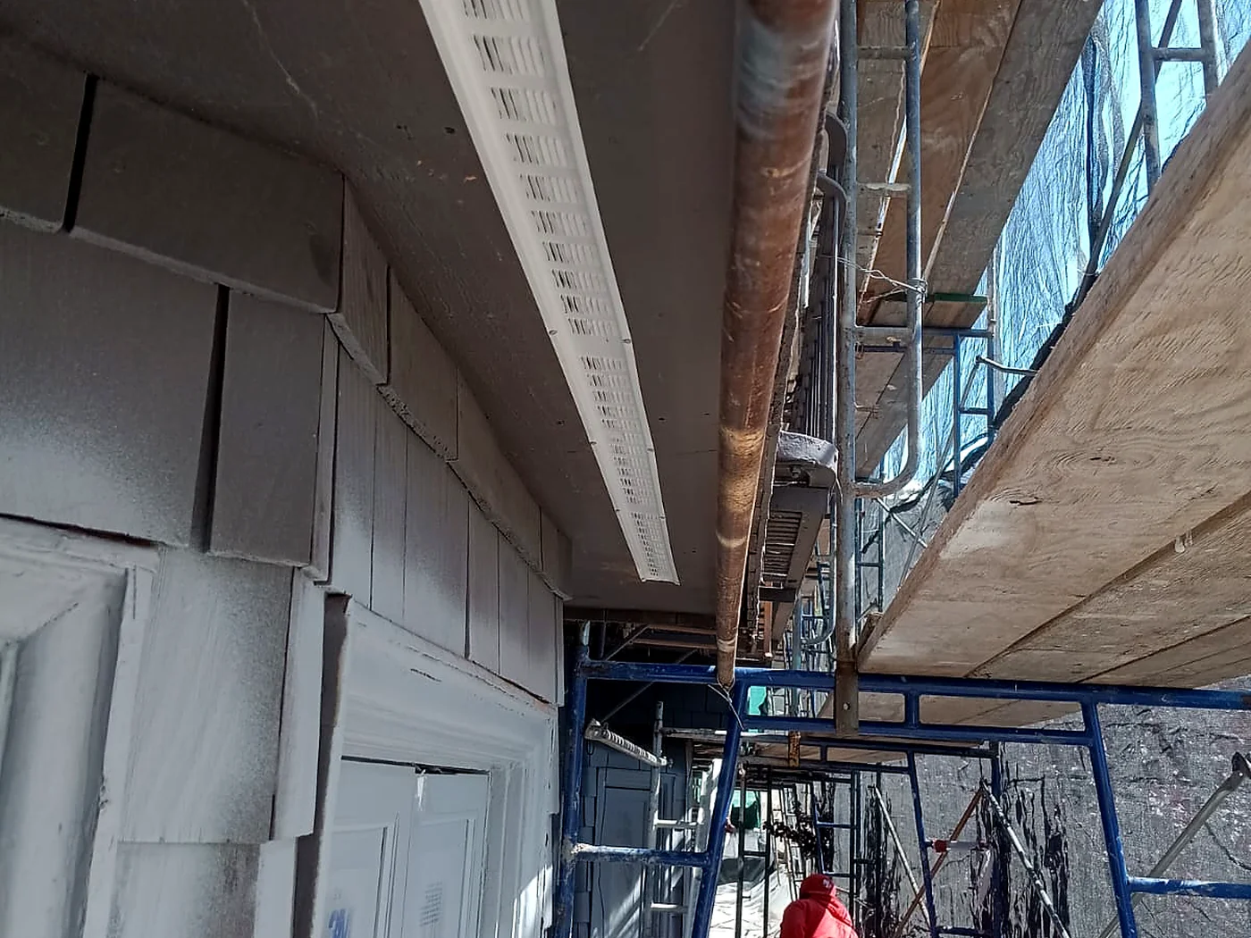 Exterior residential construction with scaffolding